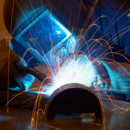 A man making a weld